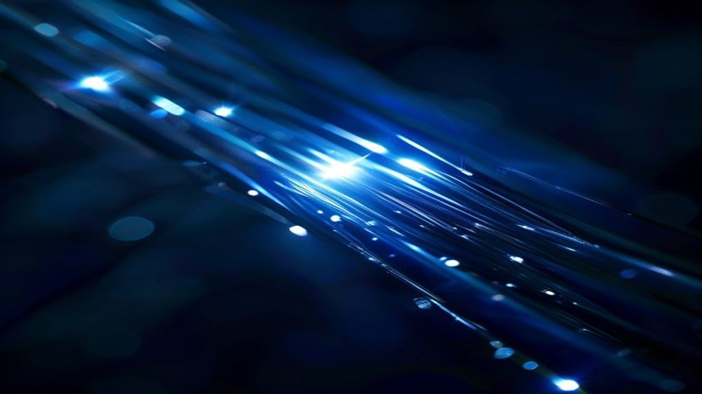 Macro shot of fiber-optic strands carrying light